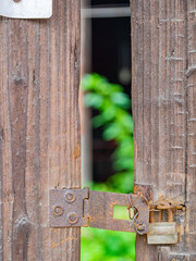 Close up shot of a locked door in Shuitou Village