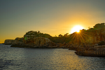 Sunset over the cliffs at Calos des Moros, Mallorca, Spain