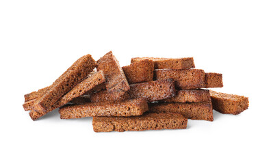 Tasty rye croutons on white background