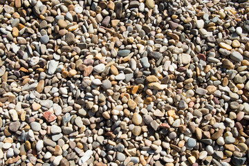 Background of mixed gravel. Gray, brown and white.