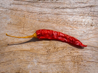 red hot chili pepper on wooden background