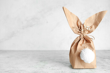 Easter bunny gift bag on light background