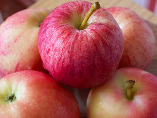 Fototapeta na wymiar Several apples of the Ligol and gala varieties, a close-up shot.