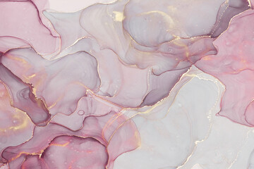 Abstract alcohol ink background in pink tones with golden splashes
