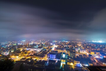 Panoramic View over Cityscape of Locarno at Night in Ticino, Switzerland.