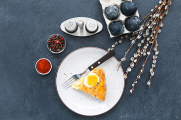 Composition with piece of tasty Easter tart, eggs, spices and pussy willow branches on dark background