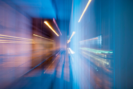 Illuminated Tunnel at Night with Light Effect in Switzerland.