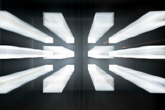 Window Display with Light Effect at Night in Switzerland.