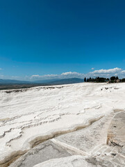 Panoramic view of travertines of Pamukkale cotton castle - unique nature wonder in Turkey