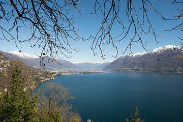 Panoramic View over Alpine Lake Maggiore with Snow-capped Mountain in Ascona, Switzerland.