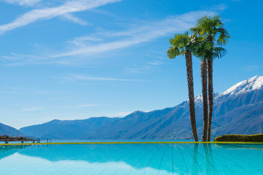 Infinity Pool and Alpine Lake Maggiore with Mountain in Ascona, Switzerland.