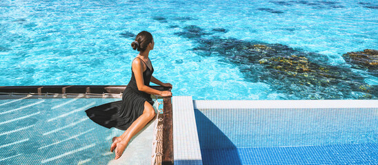 Luxury resort vacation in Bora Bora ,Tahiti, French Polynesia elegant lady tourist woman relaxing...