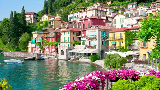 Varenna, the Lombard village of lovers on Lake Como. The small village of Varenna is the perfect place for a romantic weekend. The Walk of Lovers is pedestrian path over water of lake. RAW CINEMATIC