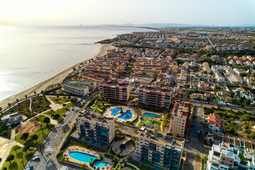 Aerial view beach and townscape of Mil Palmeras. Spain