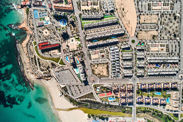 Aerial view beach and townscape of Mil Palmeras. Spain