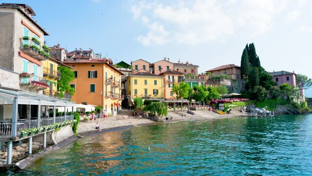 Varenna, the Lombard village of lovers on Lake Como. The small village of Varenna is the perfect place for a romantic weekend. The Walk of Lovers is pedestrian path over water of lake. RAW CINEMATIC