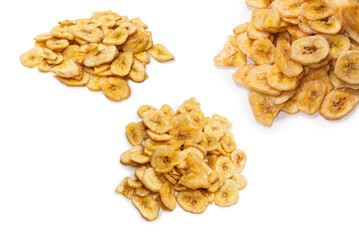 Banana chips isolated on a white background. Dehydrated banana.