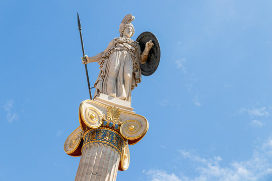 Athens, Greece. Column statue of godess Athena, one of the Olympian deities in classical Greek religion, in the modern Academy of Athens