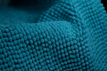 Close-up texture of a terry towel. Blue fabric.