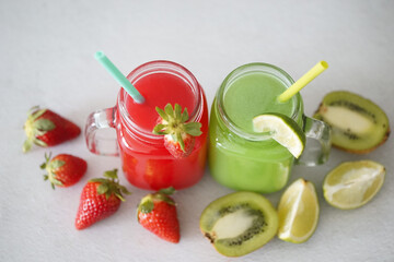 Strawberry juice and kiwi and green lime juice smoothie