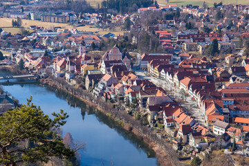 Fototapeta premium The picturesqueue scape of Frohnleiten in Austria with the river Mur in Styria, Austria