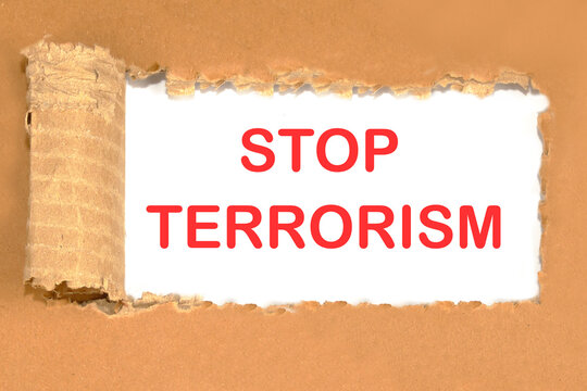 Stop Terrorism a text on paper calling for an end to violence against humanity