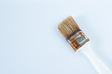 Paint bristle brush isolated on white background. Copy space. Top view. 