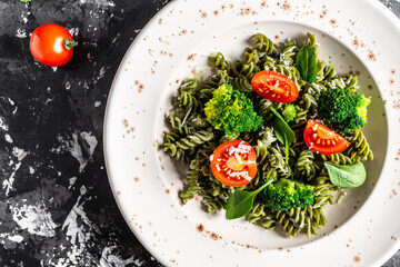 Vegetable penne pasta with spinach. proper diet. Clean eating, dieting, vegan food concept. top view