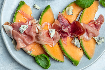 appetizer with sweet melon and ham, dorblu stilton dairy product, blue cheese roquefort gorgonzola, roquefort, cambozola, Food recipe background