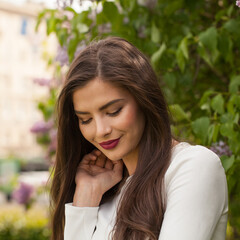 Beautiful cheerful woman smiling outdoors