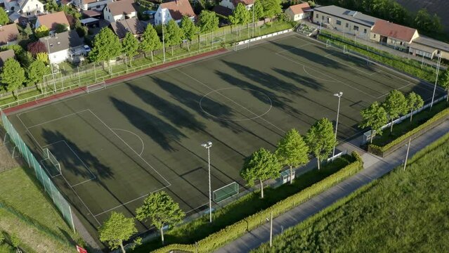 aerial drone flight over a empty German soccer Fussball field