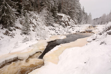 The pearl of Karelia Republic- Kivach waterfall at winter season