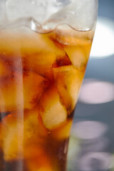  Ice cubes in cola beverage
