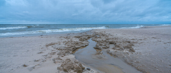 shore of the baltic sea on a cloudy day in autumn