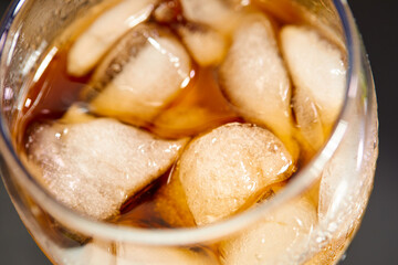  Ice cubes in cola beverage