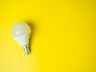 LED light bulbs on yellow background. Energy saving and environmentally friendly light bulbs.