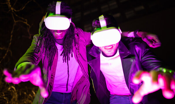 Friends exploring virtual world experience - Concept of metaverse and new virtual technology