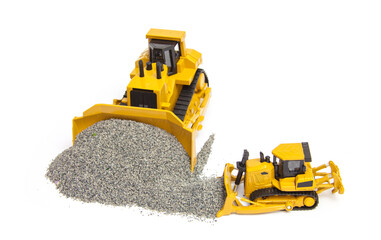 two yellow crawler bulldozers isolated on white background