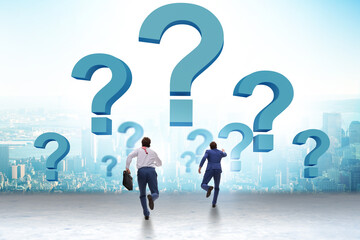 Concept of uncertainty with question and businessman