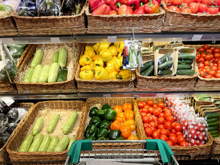 empty grocery cart in an empty supermarket