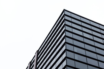 Generic corporate architecture modern building, contemporary office windows, low angle shot, simple...