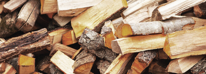 Background in the form of firewood chopped for heating the house.
