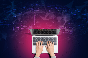 Technology screen with person using a laptop computer