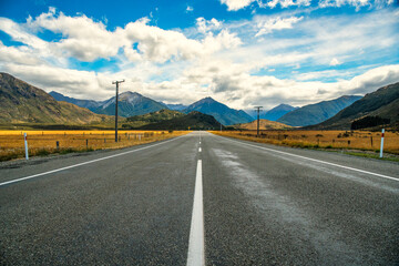 Driving down a long straight to the  mountains on The main State Highway in the Lake Sarah area...