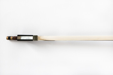 part of the bow for the violin on a white background, musical instrument