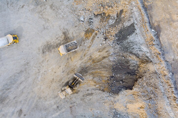Open pit mining of loading the stone gravel into heavy dump truck at the opencast mining © ungvar