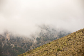 Mountain trails in the mist during winter time