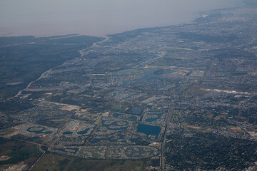 Obraz premium Cityscape. View of the city and river from a plane.