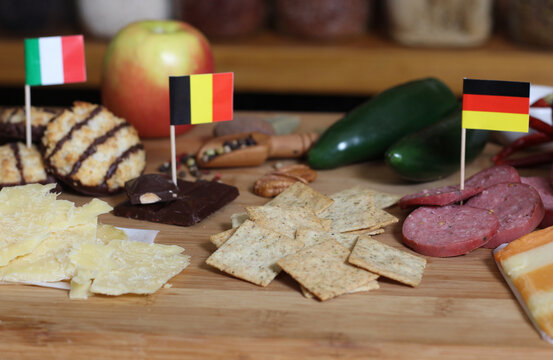 Irish Cheese With Belgian Chocolate and Coconut Macaroons in Rustic Kitchen
