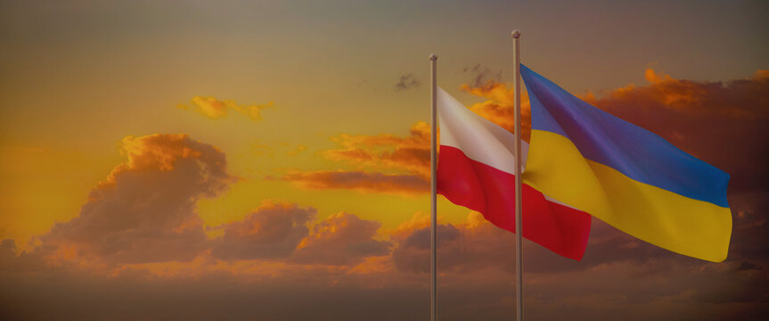 Panoramic sunset sky with Polish and Ukrainian Flags